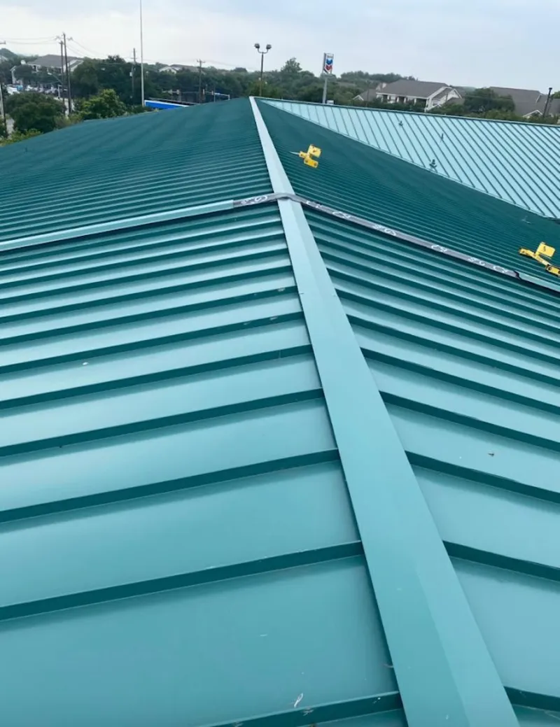 Green commercial metal roof ridge and valley for Metal Roof Repair in Oskaloosa